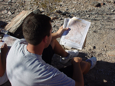 Student with topo map